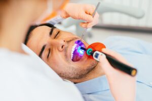 patient during a dental sealant procedure