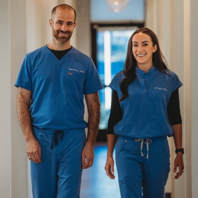 Dr. Brian Richter and Dr. Alyssa Snyder-Mughal are posing together in Parker, CO